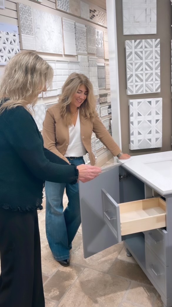 Reviewing cabinetry and material selections in a showroom